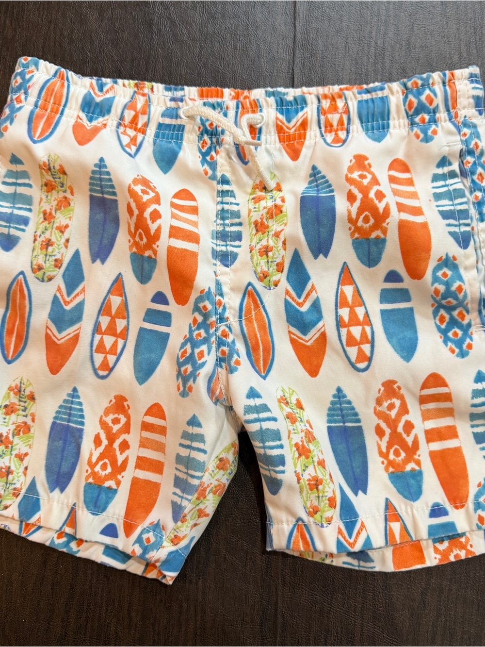 Ingear Kids White Swim Shorts with Orange & Blue Surfboard Print Sz L (10-12)
